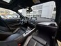 BMW 1-Serie 118i Corporate Lease High Executive | Navigatie | LM Velgen 17" | Elektrisch Glazen Panoramadak | Voorstoelen Verwarmd | M-Sportpakket | Cruise Control | Airco |