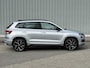 Skoda Karoq 1.5 TSI ACT Sportline Business / Nederlandse Auto / Dealer Onderhouden / All Seasonbanden / Trekhaak 1500 KG / Navigatie / Stoel- en Stuurverwarming / Adaptive Cruise Control / Voorruitverwarming / Climate Control /