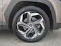 Hyundai Tucson 1.6 T-GDI PHEV Comfort 4WD Automaat / Dealer onderhouden / Trekhaak 1.350 kg / Navigatie / Trekhaak afneembaar / Camera / Apple Carplay Android / 19”  LM + All Season banden / Climate control / Cruise control /