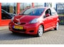 Toyota Aygo 1.0-12V Aspiration Red Aut. *63.606km!* Airco|LMV|Leder-Alcantara