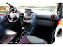 Toyota Aygo 1.0-12V Aspiration Red Aut. *63.606km!* Airco|LMV|Leder-Alcantara