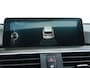 BMW 3-Serie Touring 318i Centennial High Executive | Panorama | Navigatie | Stoelverwarming | Elektrische Klep | Parkeersensoren | Climate Controle |