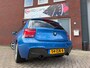BMW 1-Serie 114i Upgrade Edition / Leder / Navi / PDC / Carplay / 18 inch