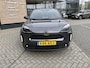 Toyota Yaris Cross 1.5 Hybrid 115 First Edition APPLE/ANDROID STOEL/STUURVERWARMING NAVI AD-CRUISE PRIVACY-GLASS 17"LM-VELGEN