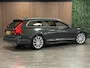 Volvo V90 T4 Aut. Inscription Luxury | Vol! | Trekhaak | Stoelventilatie | Schuifdak | 360° Camera | Head-Up Display | Polestar Engineered | Stoelmassage | Harman Kardon | Adaptieve Cruise Control | Standkachel met Volvo On Call App |  Stoelverwarming voor+achter | Stuurwielverwarming | Pilot Assist | BLIS Dode Hoek Detectie | Elektrische voorstoelen geheugen | Nappa lederen bekleding | Zitting verlenging voorstoelen | Lederen dashboard | 19 Inch | Keyless Drive | Parkeersensoren voor+achter | Elektrisch bedienbare achterklep | Geïntegreerde zongordijnen achterportieren | Verlichte instaplijsten | 4-Zone Climate Control | Alarm Klasse III | DAB Radio | Apple Carplay/Android Auto | Pine Grey Metallic |
