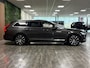 Volvo V90 T8 AWD Recharge Inscription | Trekhaak | Schuifdak | Harman Kardon | Adaptieve Cruise Control | Standkachel met Volvo On Call App | Stoel en Stuurwielverwarming | Pilot Assist | BLIS Dode Hoek Detectie | Full LED Meesturende koplampen | Parkeercamera | Elektrische voorstoelen geheugen | Lederen bekleding | Zitting verlenging voorstoelen | Lederen dashboard | 18 Inch | Keyless Drive | Parkeersensoren voor+achter | Privacy Glass | Elektrisch bedienbare achterklep | Geïntegreerde zongordijnen achterportieren | Verlichte instaplijsten | Alarm Klasse III | DAB Radio | Apple Carplay/Android Auto | Volvo On Call met mobiele App functie | Platinum Grey Metallic |