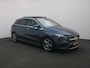 Mercedes-Benz B-klasse 250 e Business Solution AMG | Trekhaak | Distronic | Panoramadak | Memory | Sfeerverlichting | Keyless Go | Inclusief 24 maanden Mercedes-Benz Certified garantie voor Europa.