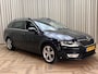 Skoda Octavia Combi 2.0 TDI *Standkachel* / Stoelverwarming / Cruise / Trekhaak / Xenon / Lane Assist / Canton Premium Audio / PDC / 17" LMV