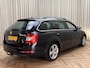 Skoda Octavia Combi 2.0 TDI *Standkachel* / Stoelverwarming / Cruise / Trekhaak / Xenon / Lane Assist / Canton Premium Audio / PDC / 17" LMV