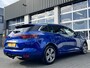 Renault Megane Estate 1.3 TCe Intens Airco Trekhaak 1700kg trekgewicht Cruise control Head up display Parkeersensoren voor en achter Telefoonverbinding Stuurwielbediening 5-Persoons Navigatiesysteem Lichtmetalenvelgen