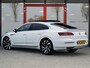 Volkswagen Arteon 1.5 TSI Business R | Origineel NL | 3x R-Line | Stoelverwarming | Schuif/ Kantel Panorama Dak | Camera | Adaptieve Cruise Control | Verwarmd Voorruit | LED Koplampen | Virtual Cockpit | 2e Eigenaar | Lederen Bekleding |