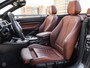 BMW 2-Serie Cabrio 220i Luxury Navigatie Camera Bi-xenon Keyless Stoelverwarming Leder Sportstoelen Trekhaak 18"