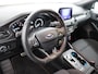 Ford Focus Wagon ST-line 1.0 EcoBoost Titanium Business ST-line Automaat, Design Pack, bluetooth, boordcomputer, cruise control, Apple Carplay/Android Auto, parkeersensoren voor/achter, rijstrooksensor, Elektronische remkrachtverdeling, Elektronis Je stapt in en meteen voel je het: deze Ford Focus Wagon is geen doorsnee gezinsauto. Strak in z’n ST-line jas, met sportieve accenten en een zelfverzekerde uitstraling, maakt hij meteen indr