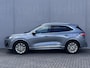 Ford Kuga 2.5 PHEV Vignale Automaat / 1.500 kg trekgewicht / Leder / Adaptieve CC / Dode hoek detectie / Parkeer assistent / Stuur-, stoel- en achterbankverwarming / B&O  sound / Navigatie / Apple Carplay Android / 18" LM wielen / Inclusief winterwielen /