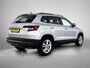 Skoda Karoq 1.5 TSI ACT Business Edition Plus 150 PK | Automaat | Elektrisch Panoramadak | Trekhaak inklapbaar | Cruise Control | Climate Control | Stoelverwarming | Achteruitrij Camera | Navigatie |