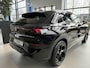 Volkswagen T-Roc 1.5 eTsi R-Line First Edition | 20 inch zwarte velgen | Panoramadak | IQ.light | Harman Kardon | elektrische achterklep | Adaptive cruise control | Sfeerverlichting | Apple carplay / android auto | Trekhaak | Navigatie |
