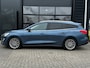 Ford Focus Wagon 1.0 125 PK Titanium-X | TREKHAAK AFNB.| ADAPTIEVE CRUISE CONTROL| HEAD-UP| B&O SOUND| STUUR, STOEL EN VOORRUITVERWARMING| CAMERA + SENSOREN| FULL LED KOPLAMPEN| KEYLESS|