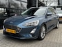 Ford Focus Wagon 1.0 125 PK Titanium-X | TREKHAAK AFNB.| ADAPTIEVE CRUISE CONTROL| HEAD-UP| B&O SOUND| STUUR, STOEL EN VOORRUITVERWARMING| CAMERA + SENSOREN| FULL LED KOPLAMPEN| KEYLESS|