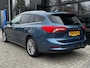 Ford Focus Wagon 1.0 125 PK Titanium-X | TREKHAAK AFNB.| ADAPTIEVE CRUISE CONTROL| HEAD-UP| B&O SOUND| STUUR, STOEL EN VOORRUITVERWARMING| CAMERA + SENSOREN| FULL LED KOPLAMPEN| KEYLESS|