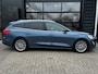 Ford Focus Wagon 1.0 125 PK Titanium-X | TREKHAAK AFNB.| ADAPTIEVE CRUISE CONTROL| HEAD-UP| B&O SOUND| STUUR, STOEL EN VOORRUITVERWARMING| CAMERA + SENSOREN| FULL LED KOPLAMPEN| KEYLESS|