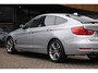 BMW 3-Serie Gran Turismo 320i High Executive|Rijklaar!|Nw.Ketting|Pano|Camera|Keyless|Xenon