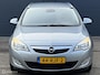 Opel Astra Sports Tourer 1.4 Turbo Cosmo - AGR STOELEN - ECC - NAVI - PDC - TREKHAAK - STOEL + STUUR VERWARMING - CRUISE CONTROLE - BLUETOOTH - EL. INKLAPBARE SPIEGELS - LMV - NAP - NL AUTO - APK T/M 02-09-2026 -