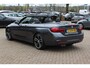 BMW 4-Serie Cabrio 420i High Executive Ed. M Sport / Camera / Leder / Harman Kardon / Nekverwarming / 19'' / Navigatie / Windscherm / DAB / Stoelverwarming / Cruise Control