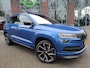 Skoda Karoq 1.5 TSI DSG ACT Sportline Business Trekhaak - Panoramadak -  Adaptieve Cr.control -Premium audio - Dodehoek detectie