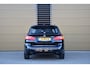 BMW 2-Serie Active Tourer 220i Centennial High Executive * Head-up * LED * Panoramadak * Lichtpakket * Dealeronderhouden *