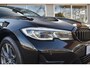 BMW 3-Serie Touring 320e Panoramadak ACC Trekhaak Stuur/Stoelverwarmin