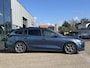 Ford Focus Wagon 1.0 EcoBoost Hybrid ST Line X 155PK Automaat Afn. Trekhaak Panodak Winterpack Adaptieve Cruise Camera Blind-Spot Parkeersensoren Keyless B&O Full-LED Climate *1500KG Trekgewicht*