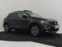 Volkswagen T-Roc 1.5 TSI Sport 150pk DSG/AUTO | Trekhaak | Panorama dak | Dodehoekdetectie  | Navigatie | Adaptief cruise control | Camera achter | Stoelverwarming | 17|"LMV"