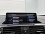 BMW 1-Serie M140i High Executive | Schuifdak | Camera | Stoelverwarming | HarmanKardon