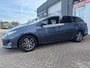 Toyota Auris Touring Sports 1.8 Hybrid Lease van 2de Eig in automaat met panoramadak en navigatie en parkeersensoren en bluetooth