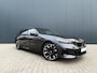 BMW 5-Serie Touring 520i Pano / B&W / tr.hk / 21 inch / HUD