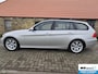 BMW 3-Serie Touring 320i High Executive lees tekst!!