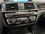 BMW 1-Serie 120i Sport Line Shadow High Executive 184Pk Automaat (SCHUIFDAK, GROOT NAVI, DEALER ONDERHOUDEN, MEMORY SEATS, LEDER, STUUR/STOELVERWARMING, PARKEERSENSOREN, TREKHAAK, NIEUWSTAAT)