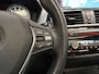 BMW 1-Serie 120i Sport Line Shadow High Executive 184Pk Automaat (SCHUIFDAK, GROOT NAVI, DEALER ONDERHOUDEN, MEMORY SEATS, LEDER, STUUR/STOELVERWARMING, PARKEERSENSOREN, TREKHAAK, NIEUWSTAAT)