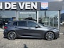 BMW 1-Serie M135i xDrive High Executive M Sport 306pk Automaat | Panodak | Elektr. achterklep | arking Pakket | Spiegel Pakket | Draadloze telefoonlader | etc. etc.