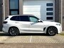 BMW X5 xDrive50e High Executive M Sport / Achteras besturing / Head-UP / Panodak / Luchtvering / Soft Close / Harman-Kardon / Trekhaak / Park Assist Prof / Individual Leder Merino / Zwarte Hemel / 1e Eigenaar!