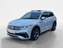 Volkswagen Tiguan 1.5 TSI R-Line Business+ | Automaat | Elektrisch uitklapbare trekhaak | Glazen schuif-/kanteldak | Elektrisch bedienbare achterklep | Stoel- en stuurverwarming | Achteruitrijcamera | Head-up display