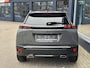 Peugeot 2008 1.2 Hybrid 145 PK GT | Meest Complete Uitvoering | Slechts 16.880 KM | Navigatie | 360 Graden Camera | Adaptieve Cruise Control | All Season Banden | Grip Control | Climate Control | Full LED Verlichting | Zwart Dak | Hoge Zitpositie | 17" Lichtmetalen Velgen |