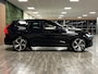 Volvo XC60 T8 AWD Recharge Ultra Dark | Bowers & Wilkins | Luchtvering | Trekhaak | 360° Camera | 455pk | Head-Up Display | Adaptieve Cruise Control | Stoelverwarming voor+achter | Stuurwielverwarming | Schuifdak | Full LED Meesturende koplampen | Pilot Assist | BLIS Dode Hoek Detectie | Black Pack; zwarte logo's voor en achter | Elektrische voorstoelen geheugen | R-Design Contour stoelen met wit stiksel en bies | Zitting verlenging voorstoelen | Lederen dashboard | 21 Inch | Google Infotainment | Keyless Drive | Elektrisch bedienbare achterklep | DAB Radio | Apple Carplay/Android Auto | Alarm Klasse III | Draadloos telefoon opladen | Volvo On Call met mobiele App functie | Onyx Black Metallic |