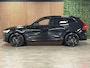 Volvo XC60 T8 AWD Recharge Ultra Black Edition | Bowers & Wilkins | Luchtvering | Trekhaak | 360° Camera | 455pk | Head-Up Display | Adaptieve Cruise Control | Stoelverwarming voor+achter | Stuurwielverwarming | Schuifdak | Full LED Meesturende koplampen | Pilot Assist | BLIS Dode Hoek Detectie | Elektrische voorstoelen geheugen | Contour stoelen met wit stiksel en bies | Zitting verlenging voorstoelen | Lederen dashboard | 21 Inch | Google Infotainment | Keyless Drive | Elektrisch bedienbare achterklep | DAB Radio | Apple Carplay/Android Auto | Alarm Klasse III | Draadloos telefoon opladen | Volvo On Call met mobiele App functie | Onyx Black Metallic |