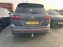 Volkswagen Tiguan 1.4 TSI eHybrid R-Line | 245 PK Automaat | SoH 91% | Black Style | 360* Camera | Trekhaak | 20' Inch | Panorama Dak | Navigatie PRO (Groot Scherm) | Digital Cockpit PRO | Keyless | Stoelverwarming