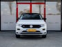 Volkswagen T-Roc 1.5 TSI Sport | R-Line | Dode Hoek Detectie | Stoelverwarming | LED Koplampen | Virtual Cockpit | Adaptieve Cruise Control | Parkeersensoren | Metallic Lak | Two-Tone | Elektrische Kofferklep | Navigatie | Apple Carplay | Android Auto |