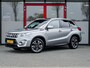 Suzuki Vitara 1.4 Boosterjet Stijl | Trekhaak | Schuif/ Kantel Pano Dak | Origineel NL | Camera | Navigatie | Adaptieve Cruise Control | 2e Eigenaar | Privacy Glas | Stoelverwarming | Flippers | Climate Control | Parkeersensoren | Metallic Lak |