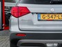 Suzuki Vitara 1.4 Boosterjet Stijl | Trekhaak | Schuif/ Kantel Pano Dak | Origineel NL | Camera | Navigatie | Adaptieve Cruise Control | 2e Eigenaar | Privacy Glas | Stoelverwarming | Flippers | Climate Control | Parkeersensoren | Metallic Lak |