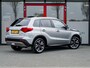 Suzuki Vitara 1.4 Boosterjet Stijl | Trekhaak | Schuif/ Kantel Pano Dak | Origineel NL | Camera | Navigatie | Adaptieve Cruise Control | 2e Eigenaar | Privacy Glas | Stoelverwarming | Flippers | Climate Control | Parkeersensoren | Metallic Lak |