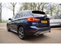 BMW X1 SDrive20i Orange Edition III AUTOMAAT/PANO DAK/CRUISE/NAVI/TREKH/NL-AUTO/HEAD-UP/STOEL VERW/CAMERA/LEDER/KEYLESS/XENON LED